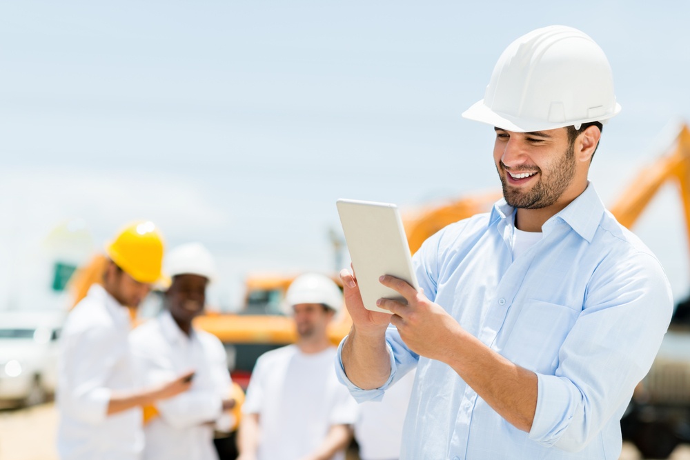 Male-engineer-at-a-construction-site-with-a-tablet-computer-1